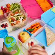 child with lunchbox - strawberry shake - b.box for kids